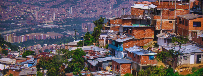 Scenic view of Comuna 13, a symbol of transformation in Medellín, featured in the Medellin Travel Guide, illustrating the city's resilience, perfect for those engaged with Colombia Spanish to learn Spanish and immerse in the rich tapestry of Medellín, Colombia.