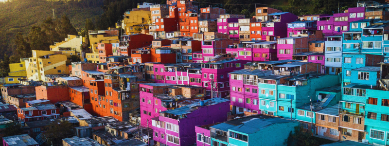 Explore the vibrant neighborhoods of Bogotá where each colorful facade tells a story, perfect for enhancing your Colombian Spanish lessons with Colombia Spanish in the spirited city of Medellín, Colombia.